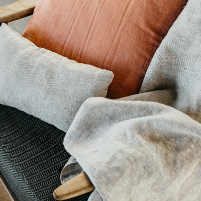 A close-up of a woven fabric with a soft, inviting texture.